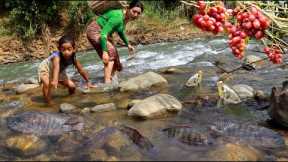 Mother with daughter catch a lot fish and pick wild grape fruit- Fish roasted eat with mango sauce