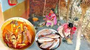 santali tribe traditional cooking RIVER FISH curry with brinjal prepared by santali tribe women