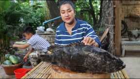 Mom and children cook big ocean fish eat with Cambodia noodle - Cook and eat