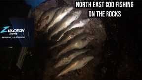 North east cod fishing from the rocks at low tide